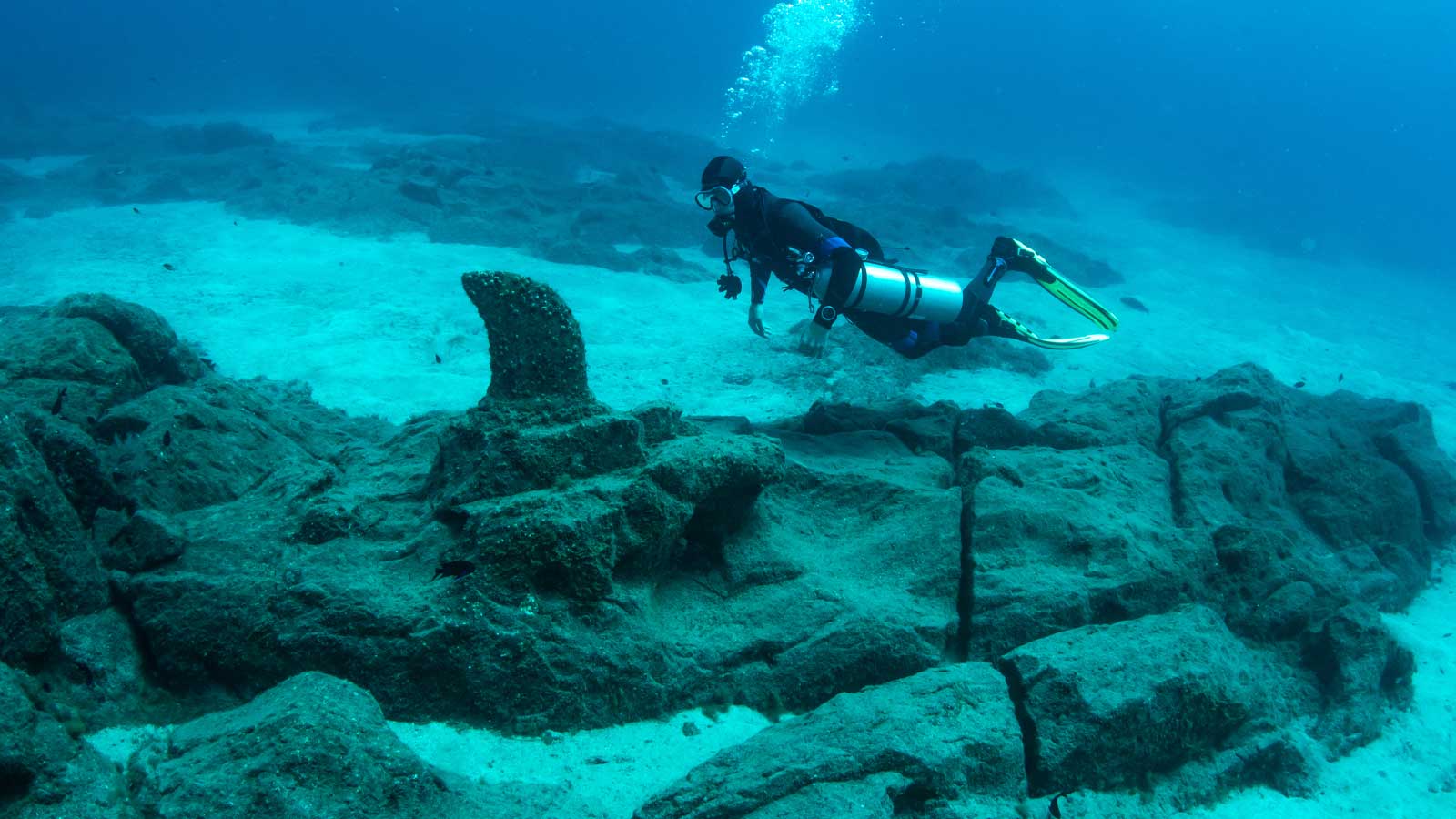 Sidemount diver exploring a vibrant reef, showcasing diving specialties offered by LoCura Diving in Tenerife